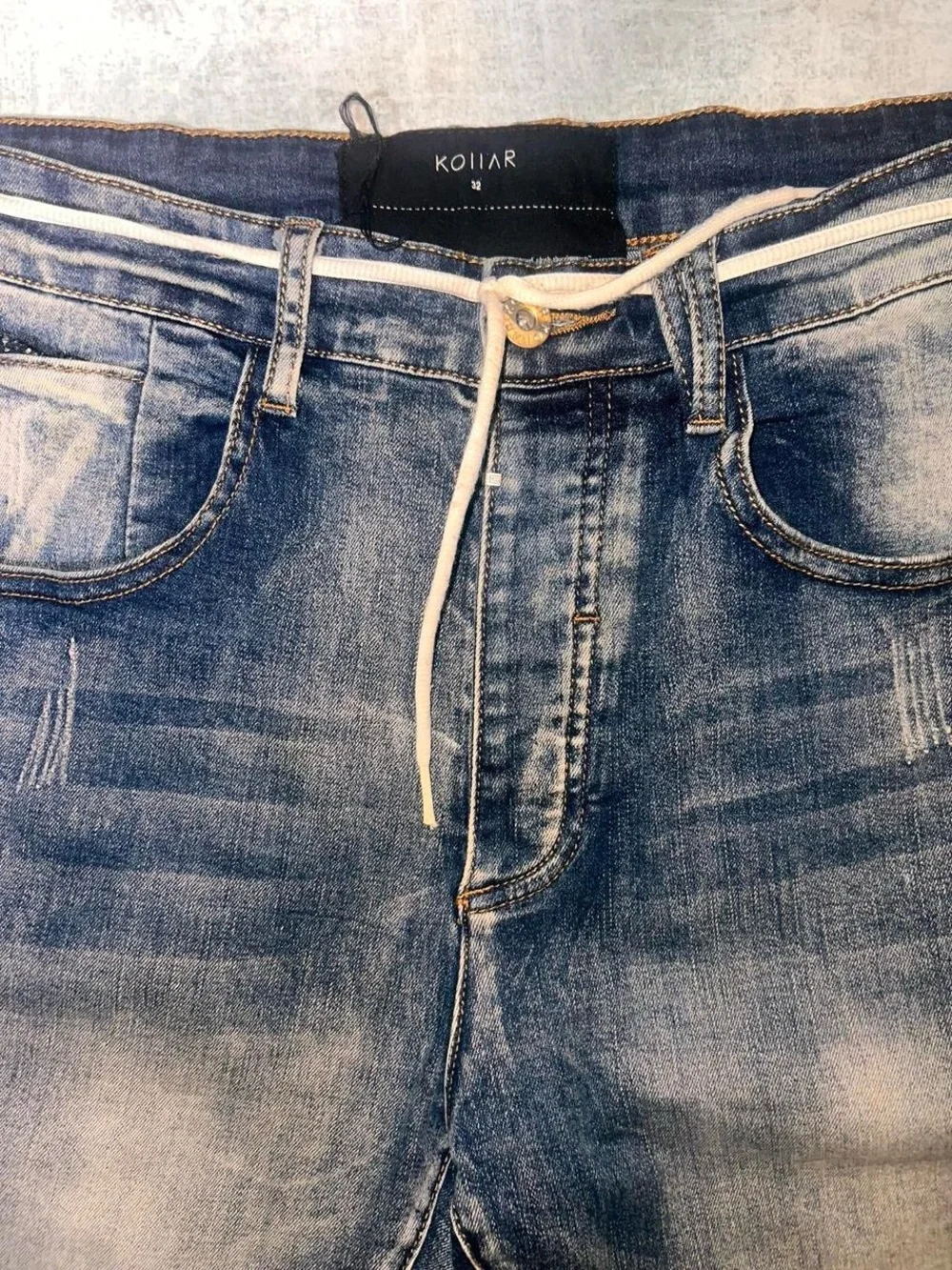 Kollar Denim Retail $98 Distressed with a stretch White Drawstring